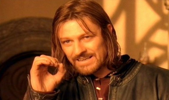 Boromir raises a hand to explain the difficulty.